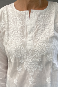 White on white chikankari embroidered button up short kurta top.