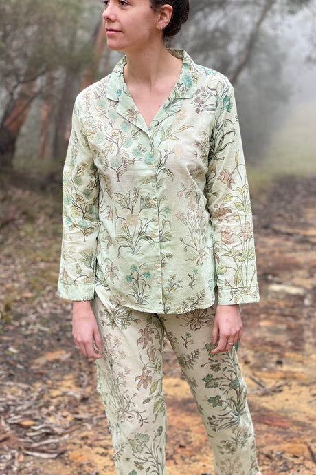 Juniper Hearth ethically made cotton voile full length pyjamas, beautiful vanilla, light turquoise and taupe floral print on soft celadon green background.