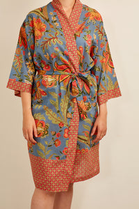 Cotton voile kimono robe dressing gown in mid blue with a tropical floral print in coral and cream and contrasting trim.
