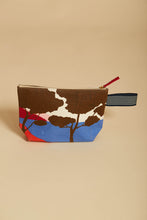 Load image into Gallery viewer, Inoui Editions designed in France Azure cosmetics bag, featuring abstract landscape in azure, red and rust.