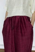 Load image into Gallery viewer, Mason and Mill Enid pants in ruby red mulberry silk, drawstring waist pyjama style.