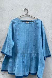 Dve Collection handloom jamdani weave cotton Padma top in light indigo.