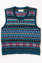 Load image into Gallery viewer, Eribe Westray Shetland wool fairisle vest in Midnight, shades of blue with highlights in magenta.