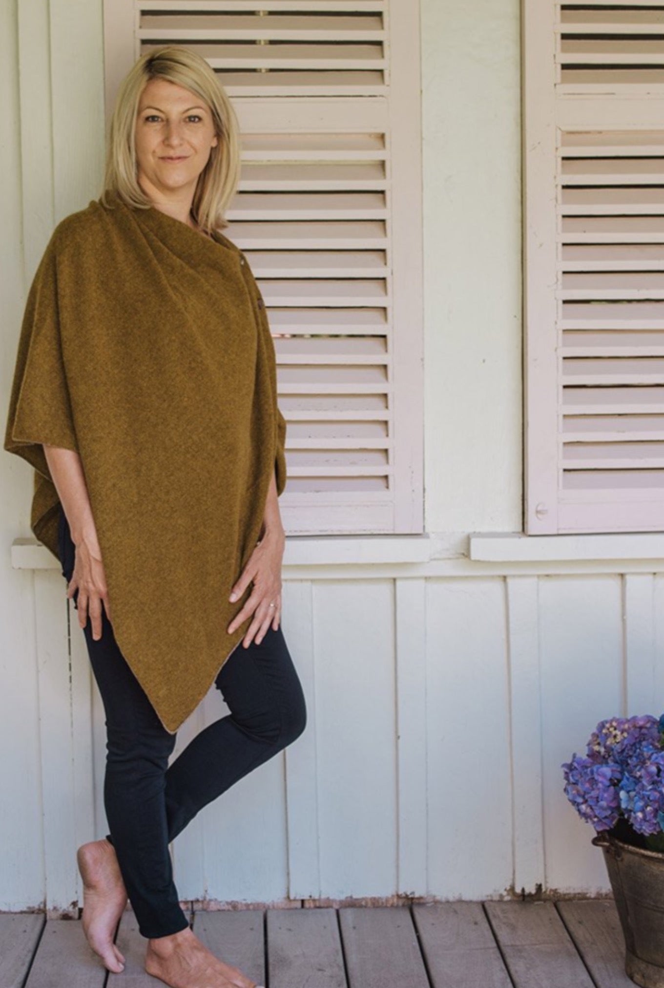 Juniper Hearth baby yak wool poncho in colour maize, mustard yellow.