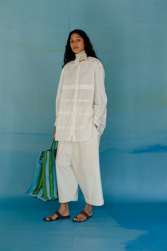 Runaway Bicycle Eda shirt, loose fit long sleeve shirt in white handloom cotton with horizontal tuck detailing.