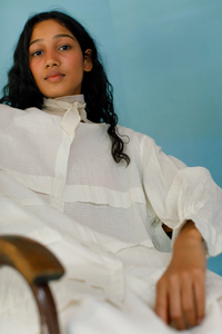 Runaway Bicycle Eda shirt, loose fit long sleeve shirt in white handloom cotton with horizontal tuck detailing.