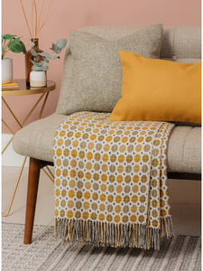 Bronte by Moon made in England Milan throw in Gold, geometric spot design in mustard yellow, bronze and silver grey.