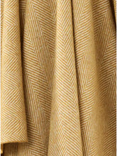 Load image into Gallery viewer, Bronte by Moon Herringbone throw in gold merino wool. Made in England.
